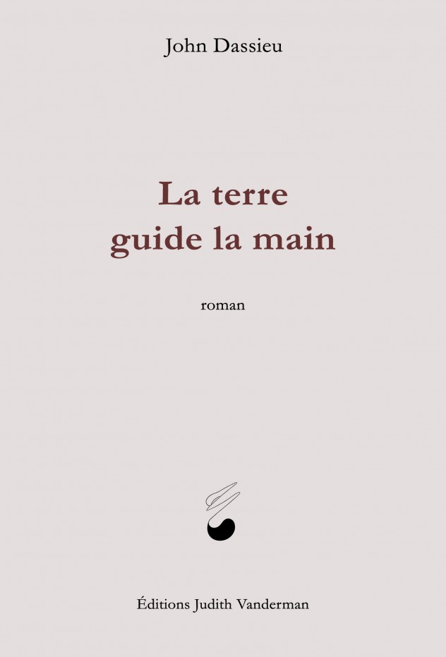 Couverture de La terre guide la main de John Dassieu